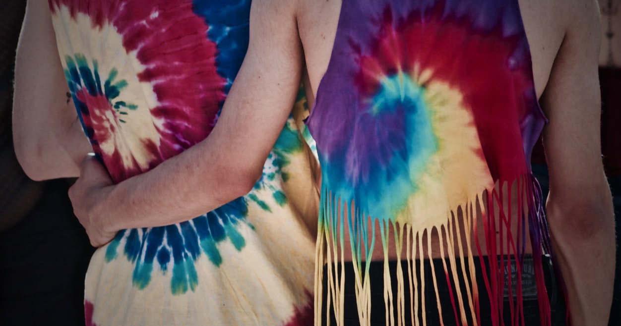 LGBT couple wearing tie-dye